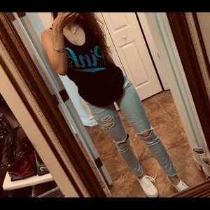 Distressed light wash jeans